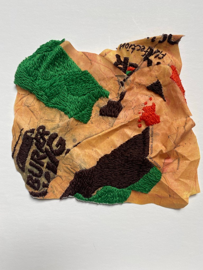 A logo of a circle with a line through it.